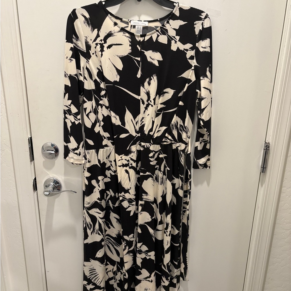 Elegant Black and Cream Floral Dress with cutout detail at front